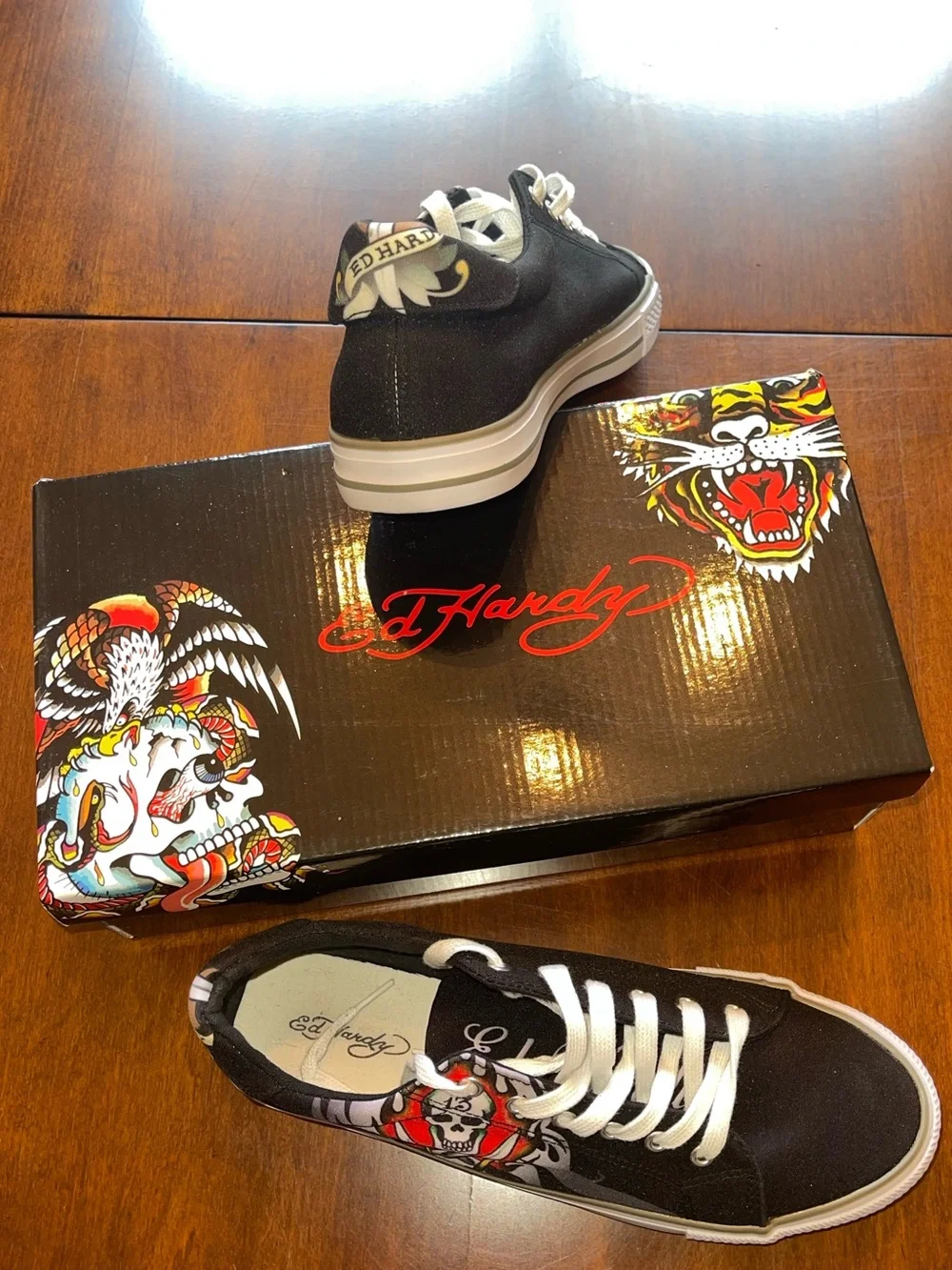 Ed Hardy Black Sneakers with Red and White Skull Graphic